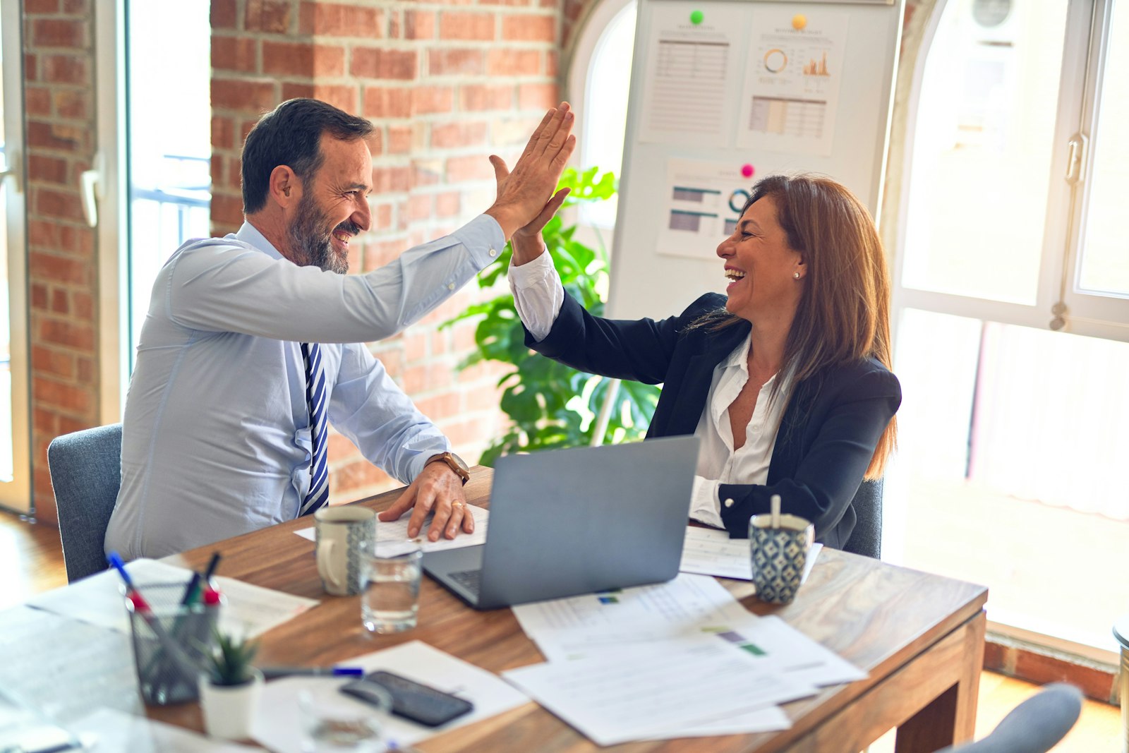 Professionals reviewing a deal